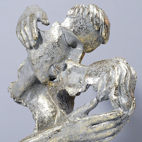 Scultura del volto di coppia