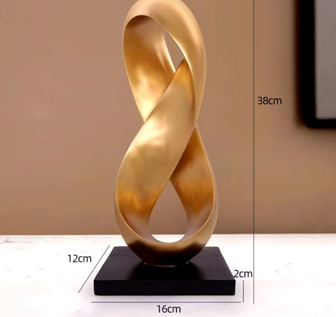 Scultura astratta dorata in resina 38 cm