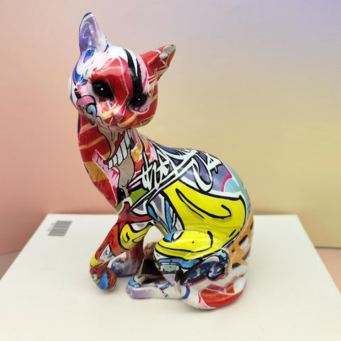 Statua gatto seduto in resina graffiti 20 cm