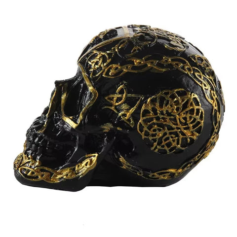 Statua di teschio messicano nero e oro 12 cm