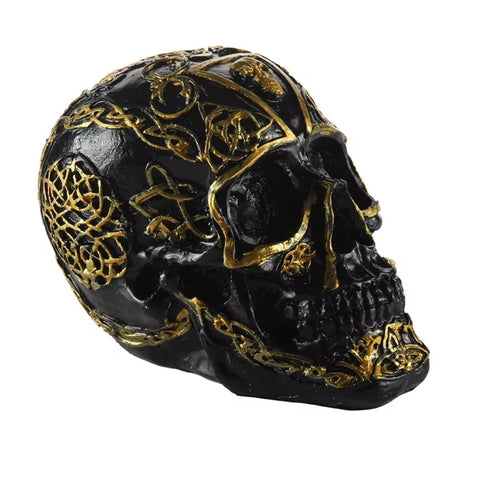 Statua di teschio messicano nero e oro 12 cm