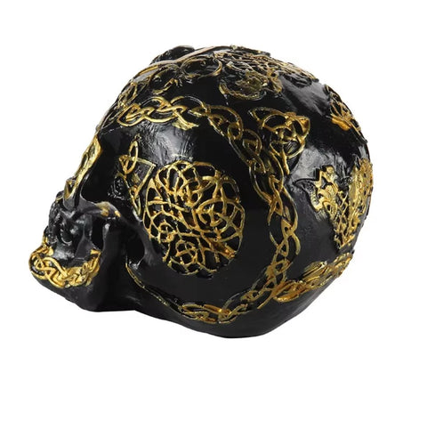 Statua di teschio messicano nero e oro 12 cm