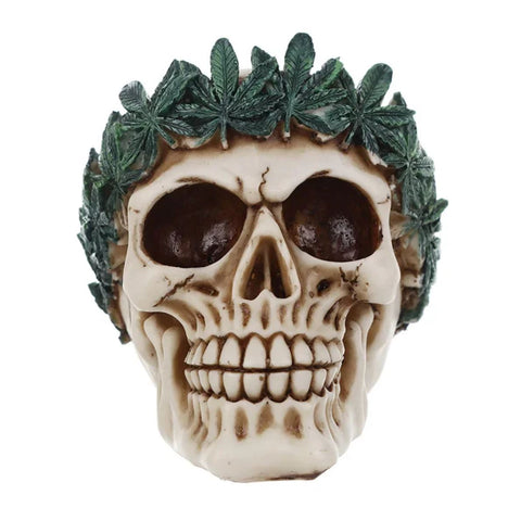 Statua teschio corona di foglie 12 cm