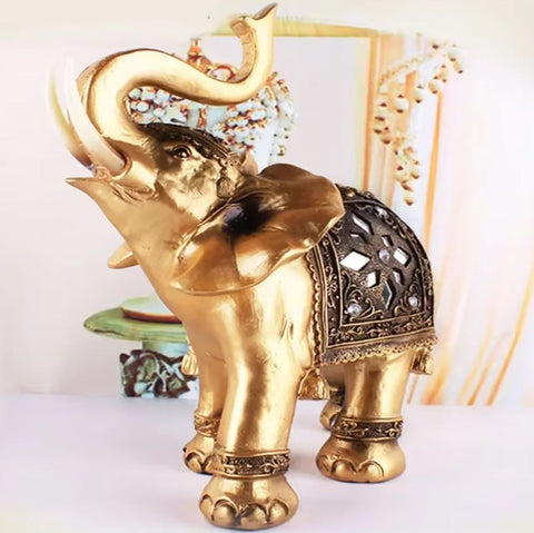 Statua elefante in resina dorata 15 cm