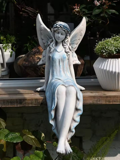 Statua di fata seduta per esterni 62 cm