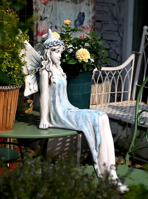 Statua di fata seduta per esterni 62 cm