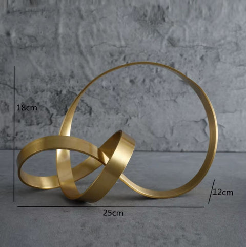 Scultura in metallo con nastro dorato 18 cm