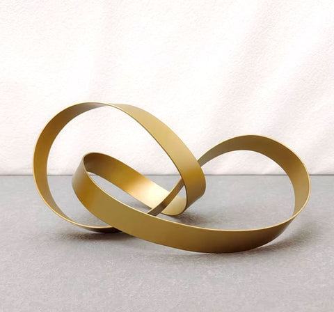 Scultura astratta in metallo dorato 14 cm