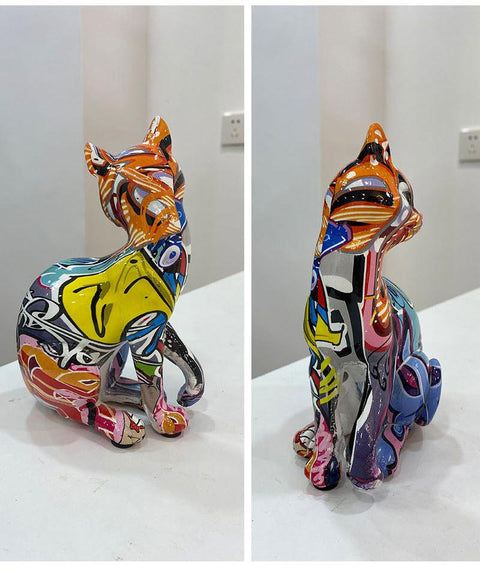 Statua gatto seduto in resina graffiti 16 cm