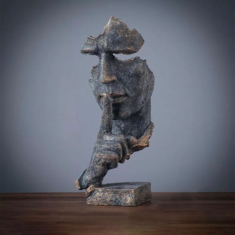 Statua del volto dell'uomo<br> Il silenzio è d'oro