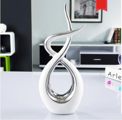 Scultura astratta<br> Abbraccio d'oro