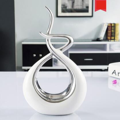 Scultura astratta<br> Abbraccio d'oro