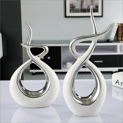 Scultura astratta<br> Abbraccio d'oro