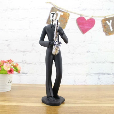 Statua dell'uomo<br> Gruppo di musicisti