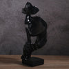 Statua dell'uomo<br> Silenzio sul volto
