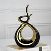 Scultura astratta<br> Abbraccio d'oro